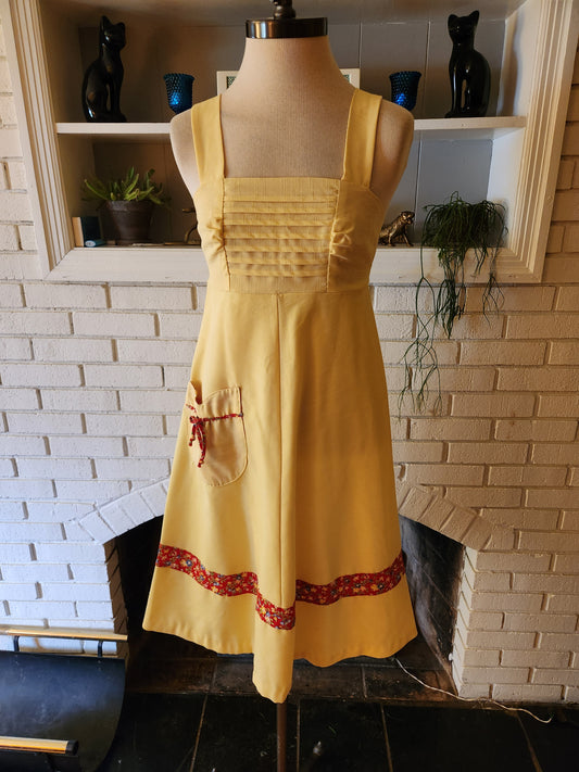 Vintage Sleeveless Yellow Dress with Floral Accents